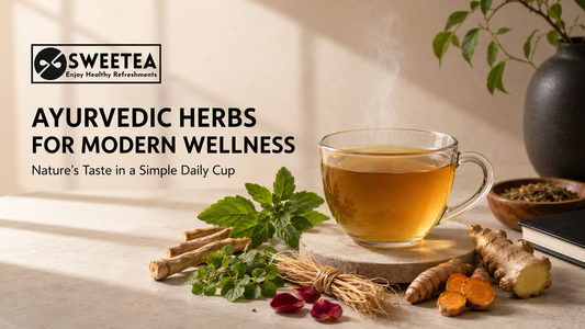 Ayurvedic herbs including tulsi, ashwagandha, brahmi, turmeric and ginger arranged beside a warm cup of herbal tea for modern daily wellness by Sweetea.