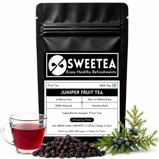Juniper Fruit Tea featuring premium dried juniper berries and a freshly brewed herbal infusion with a distinctive aromatic character.