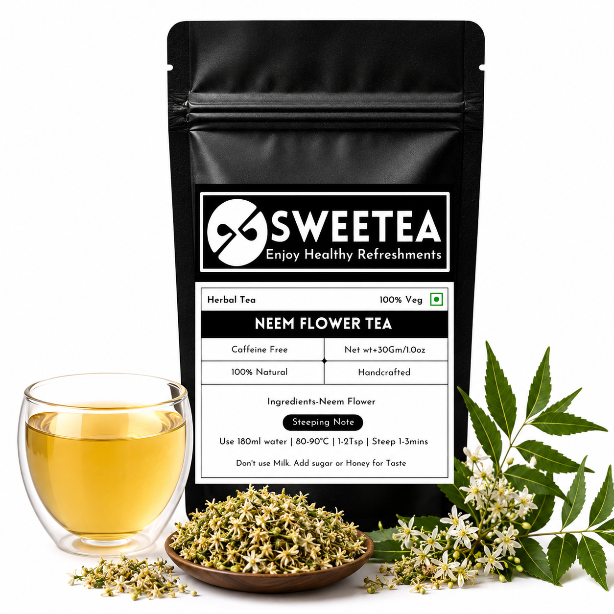 Cup of neem flower tea with dried neem flowers and loose herbal tea leaves, a natural wellness infusion from Sweetea