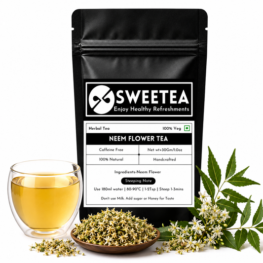 Cup of neem flower tea with dried neem flowers and loose herbal tea leaves, a natural wellness infusion from Sweetea