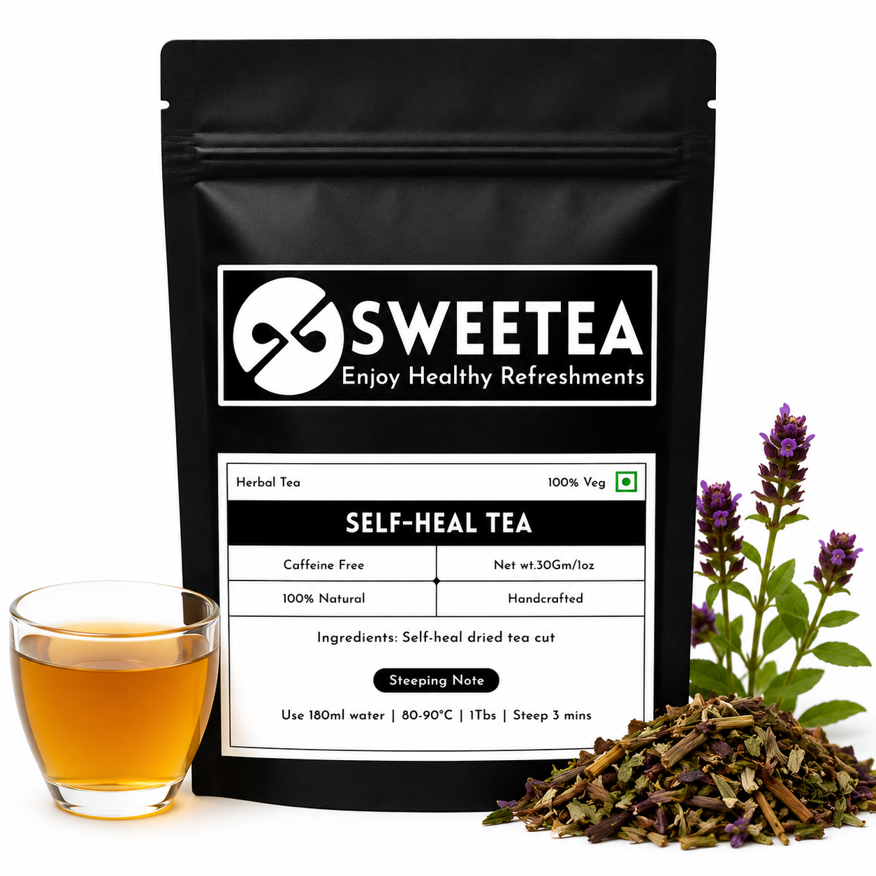 A black stand-up pouch of Sweetea Self-Heal Tea with a white label, shown on a white background with a glass of amber tea, loose dried tea leaves, and purple flowers.